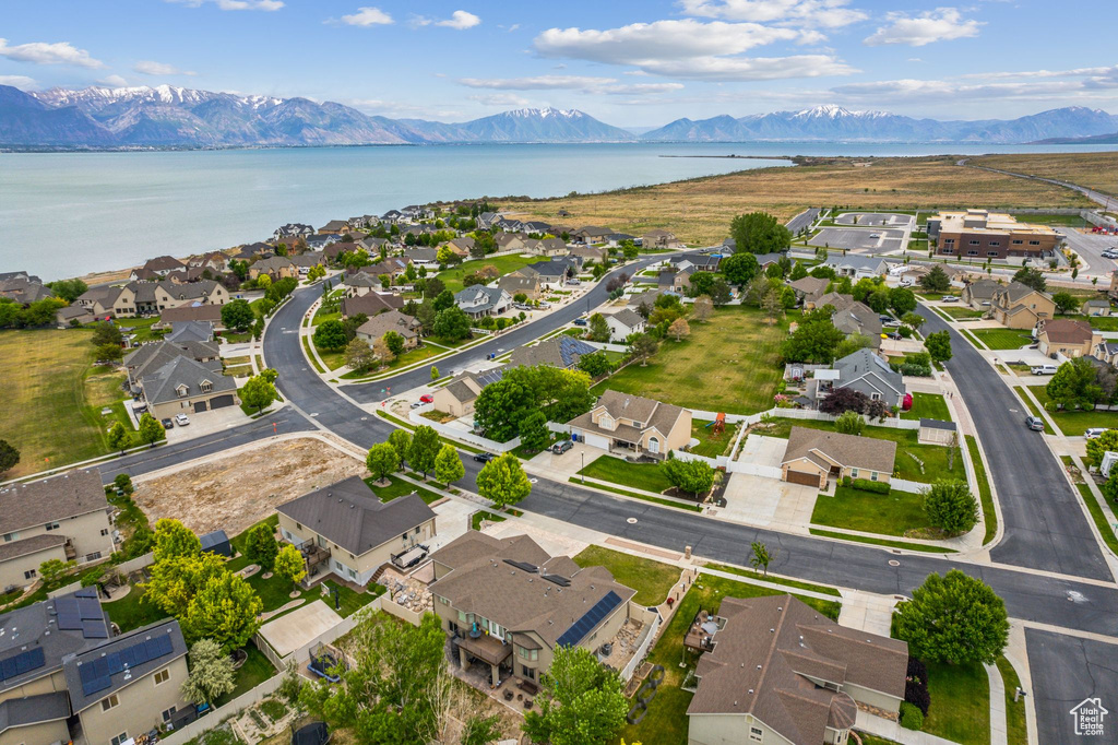 Aerial view of residential area featuring a water and mountain view