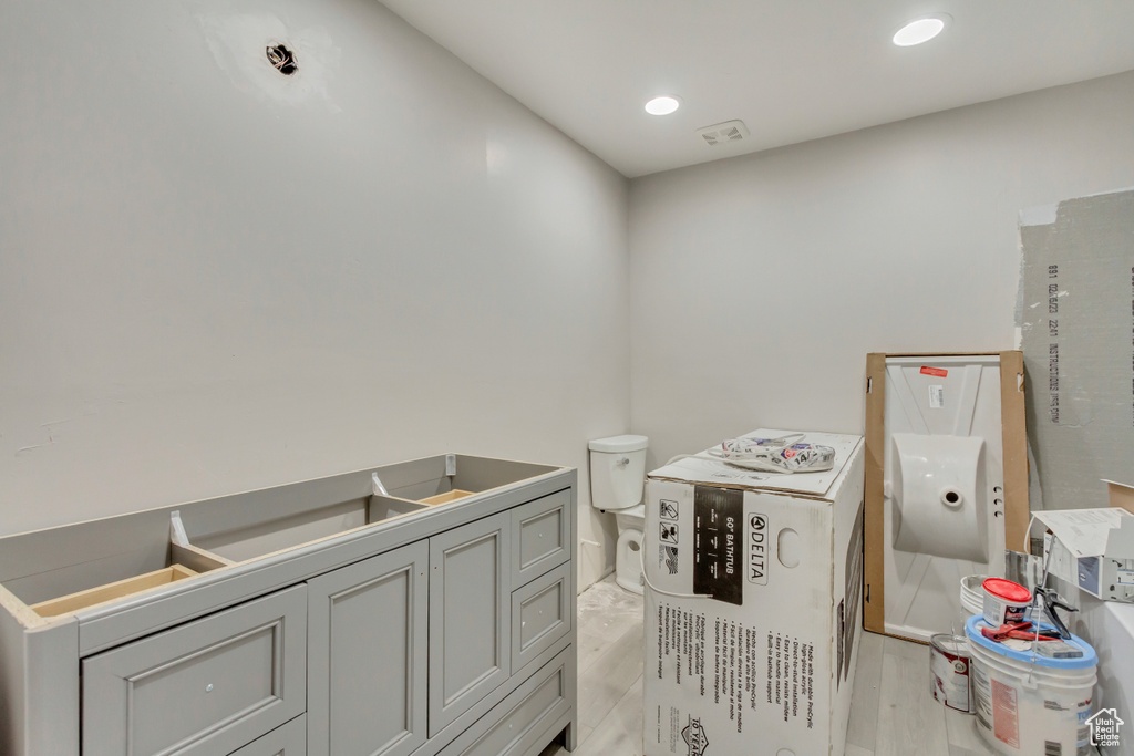 Bathroom with wood-type flooring