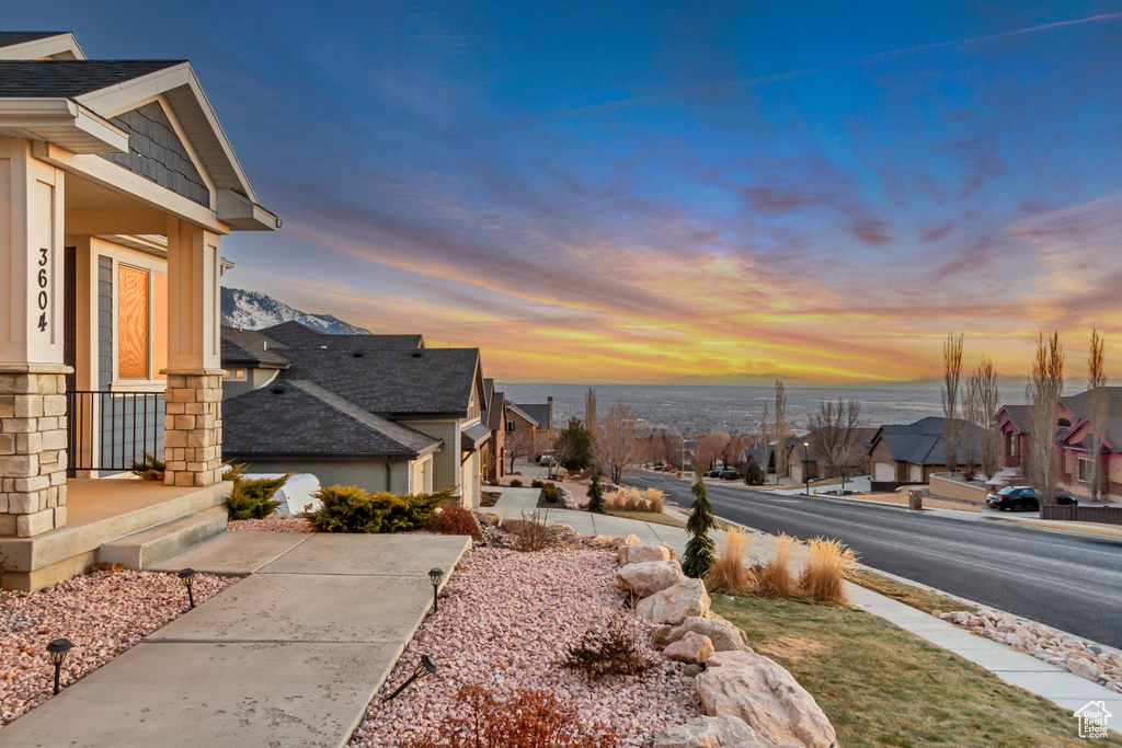 View of property exterior at dusk