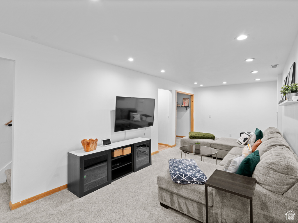 Living room with light colored carpet