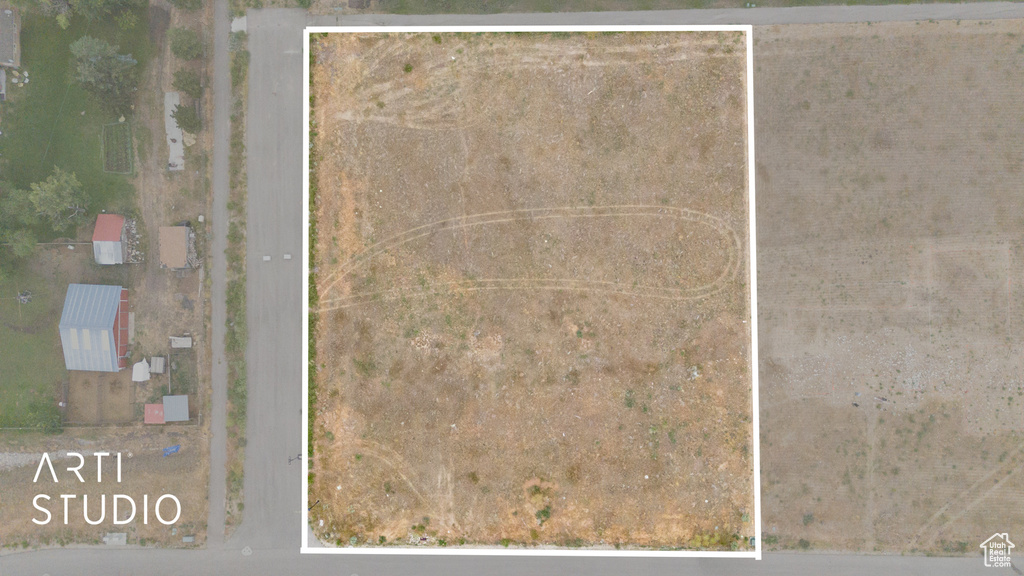 Aerial overview of property's location with property parcel outlined