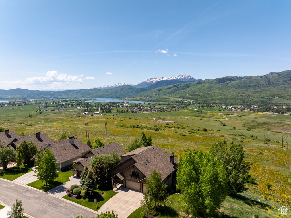 View of mountain backdrop with a nearby body of water