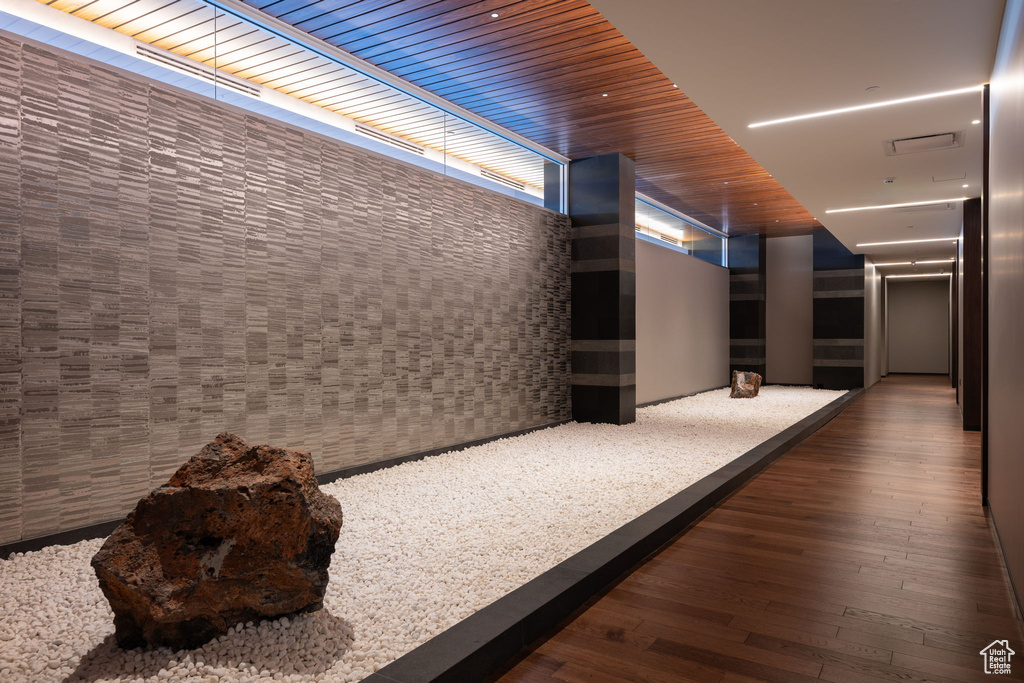 Hallway featuring dark hardwood / wood-style flooring