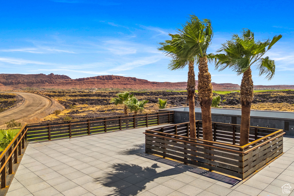View of patio / terrace with a mountain view