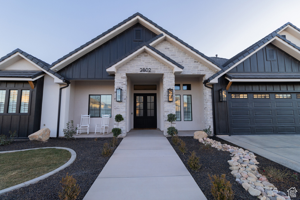 View of front of property featuring a garage