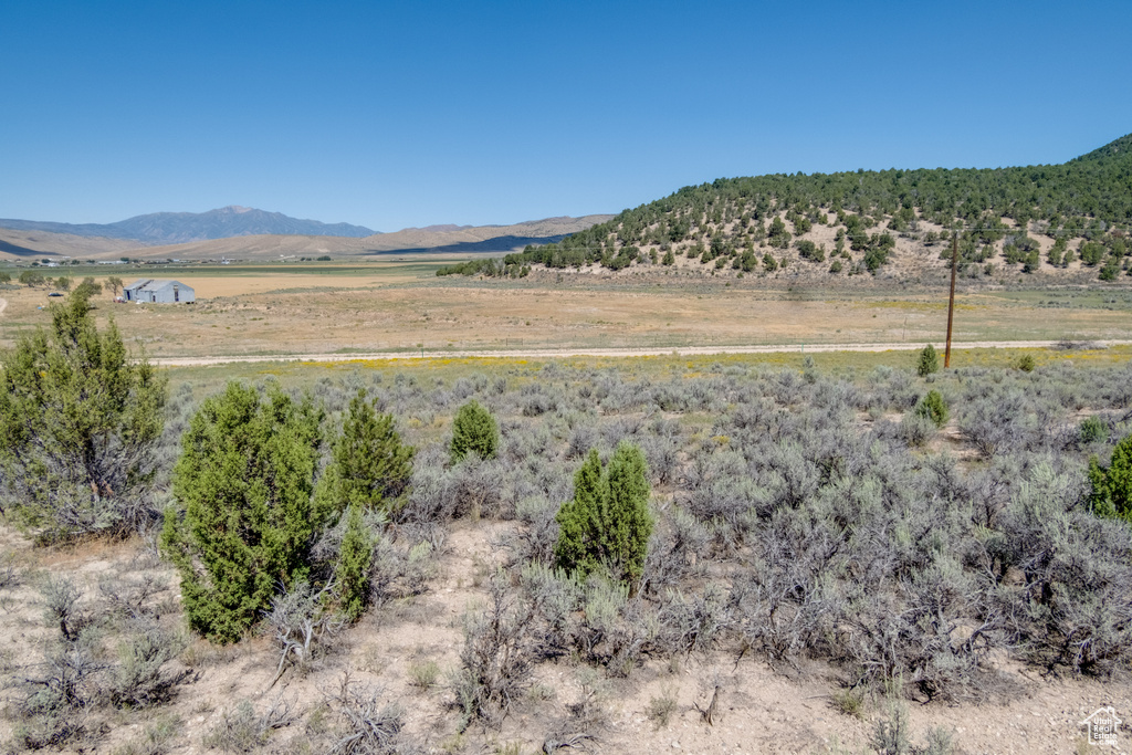 View of mountain feature with a rural view