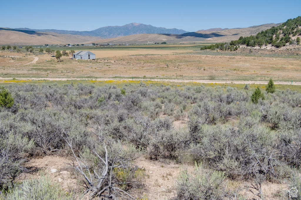 Property view of mountains featuring a rural view