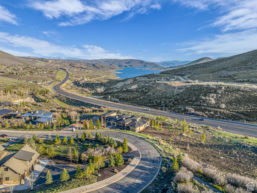 Aerial perspective of suburban area with a mountain backdrop