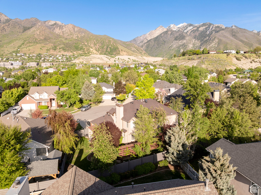 Aerial view of residential area with a mountain backdrop
