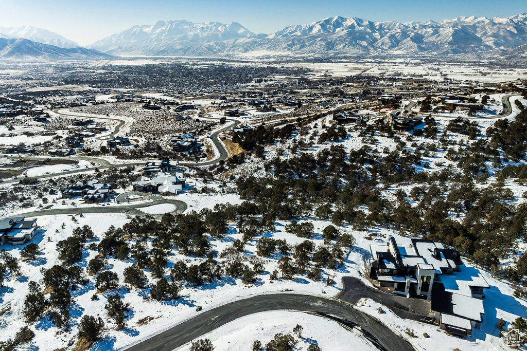 Snowy aerial view with a mountain view