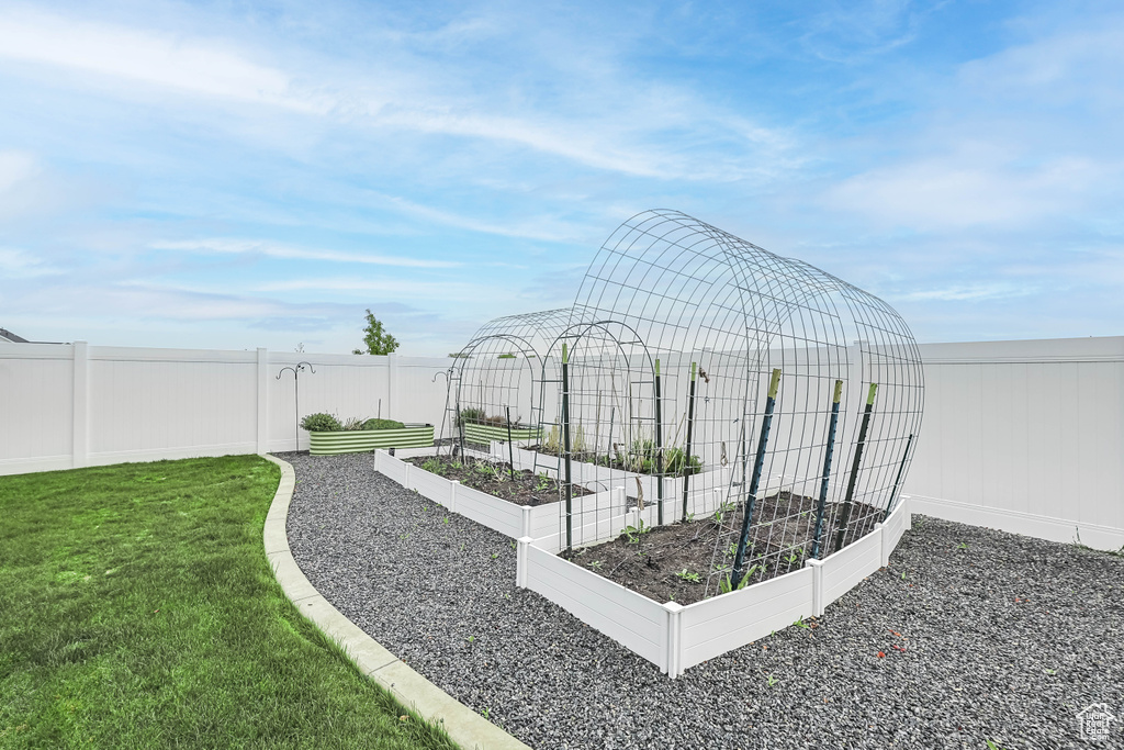 View of community featuring a vegetable garden