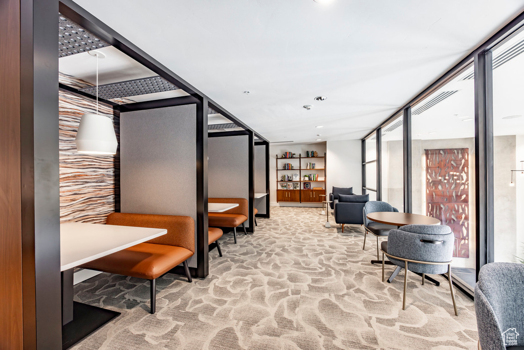 Community lobby featuring a wall of windows