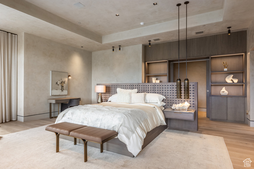 Bedroom with light wood-type flooring