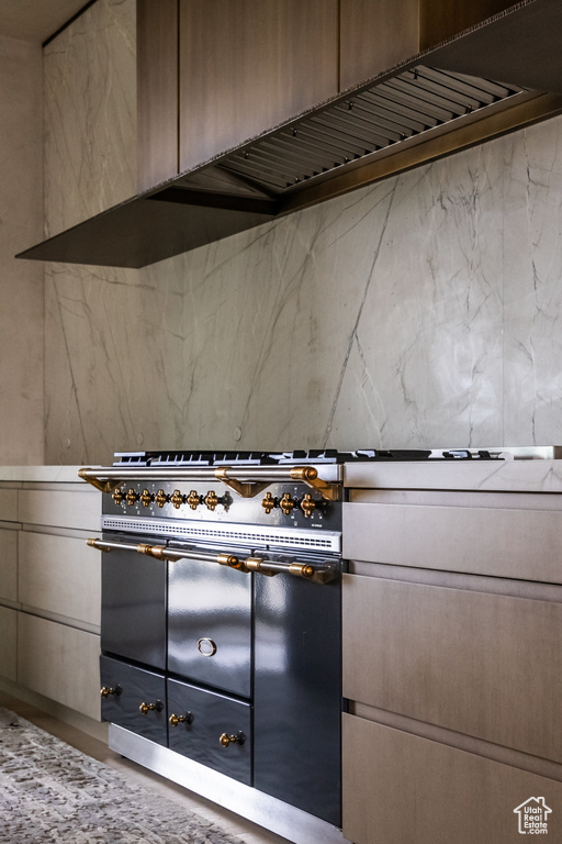 Kitchen featuring range with two ovens