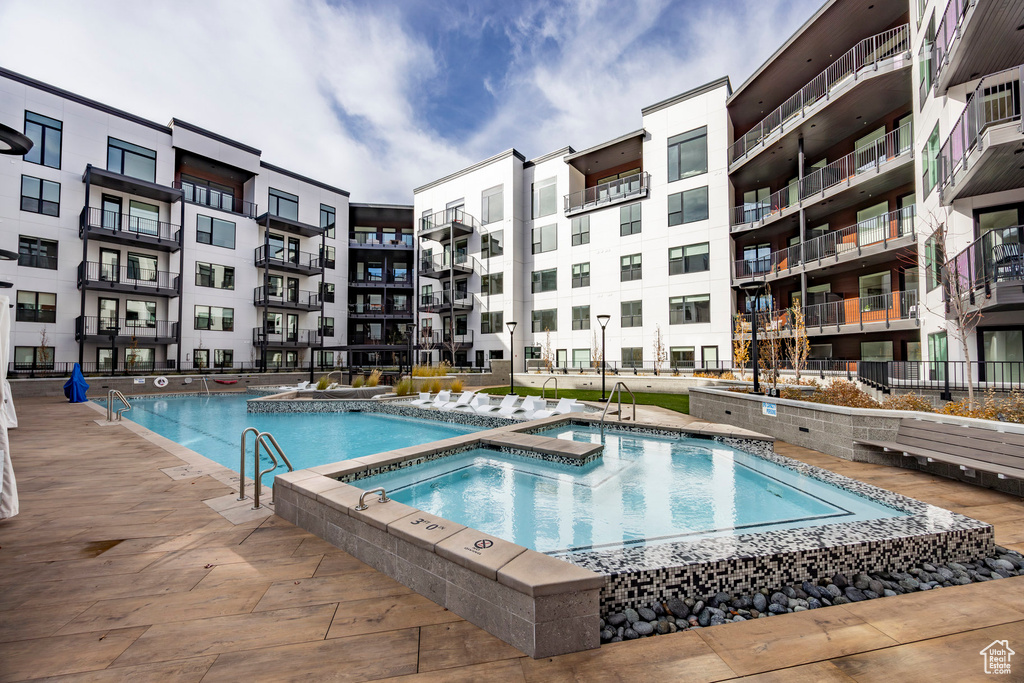 Community pool with a community hot tub