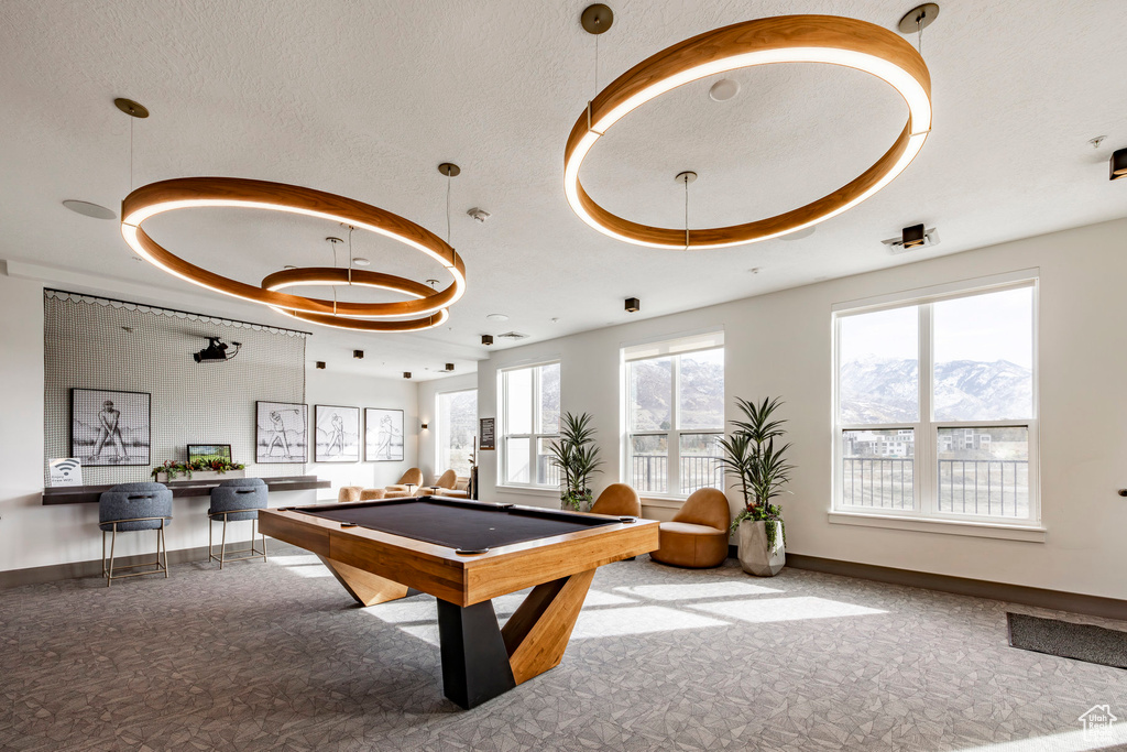 Playroom with billiards table, baseboards, and a mountain view