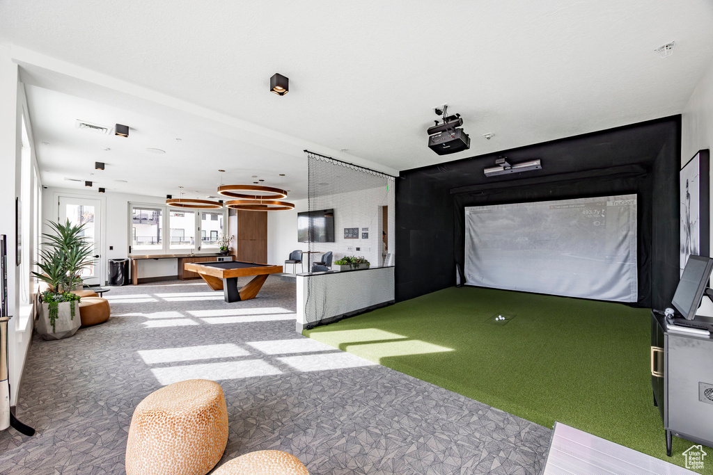 Recreation room featuring golf simulator, light carpet, and billiards table