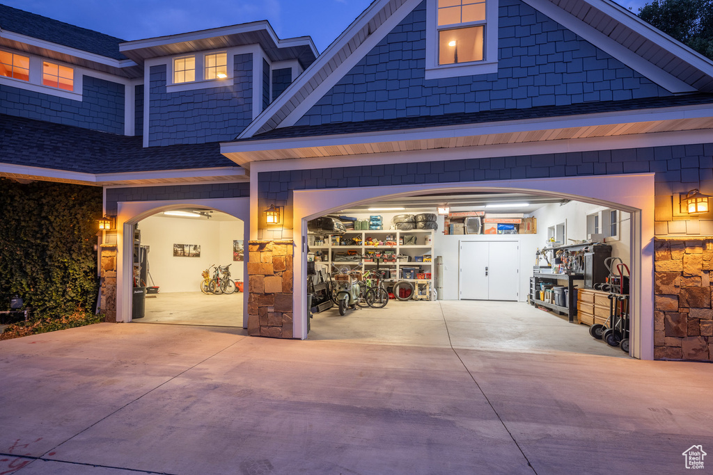 Garage with concrete driveway