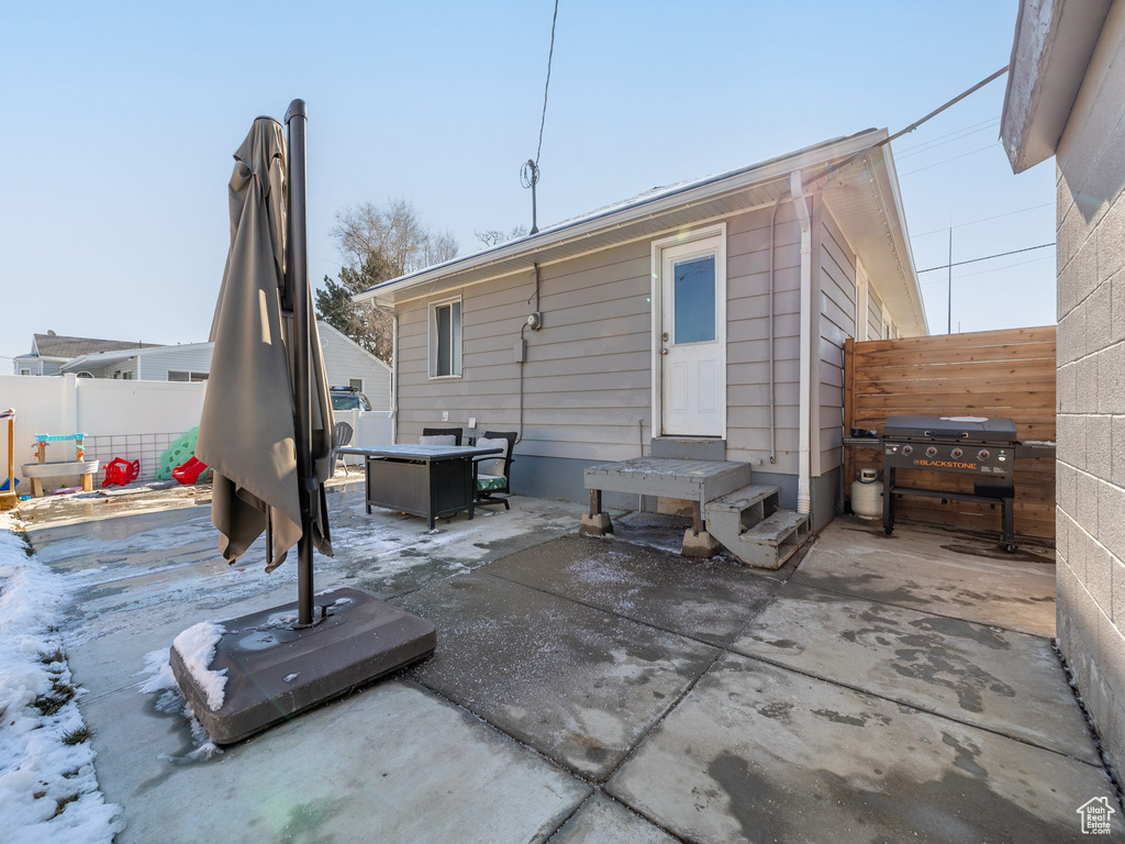 Rear view of property with a patio