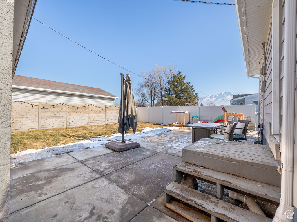 View of patio featuring a mountain view