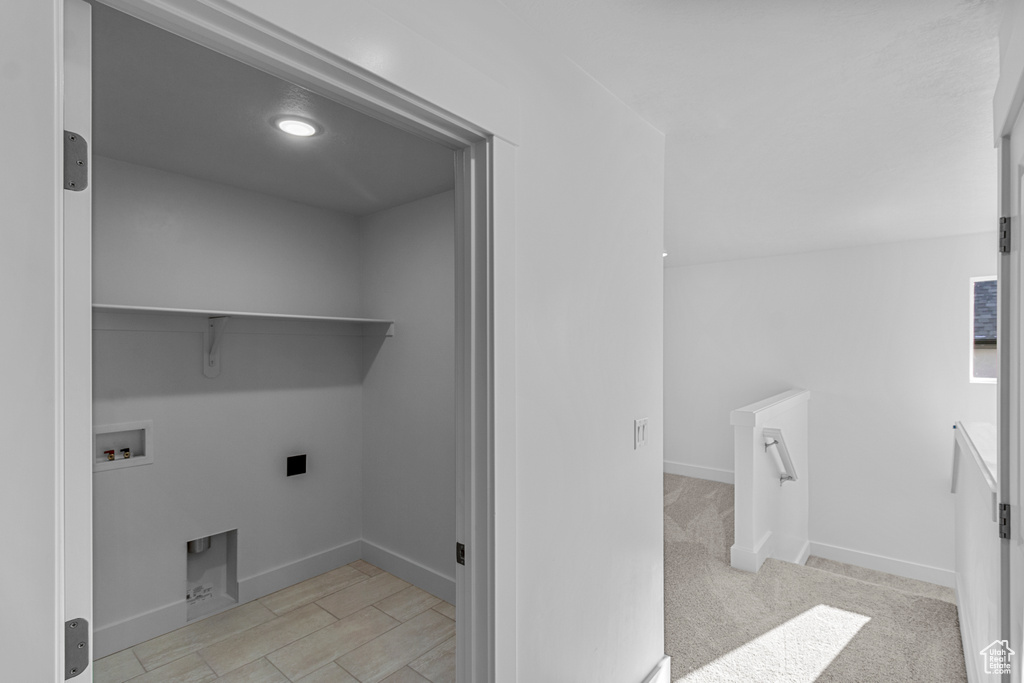 Laundry room with hookup for a washing machine