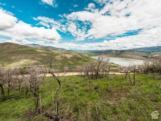 Mountain view with a water view and a rural view