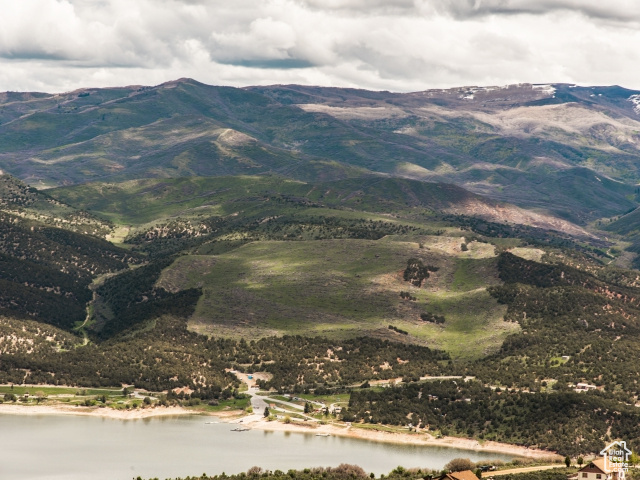 Mountain view featuring a water view