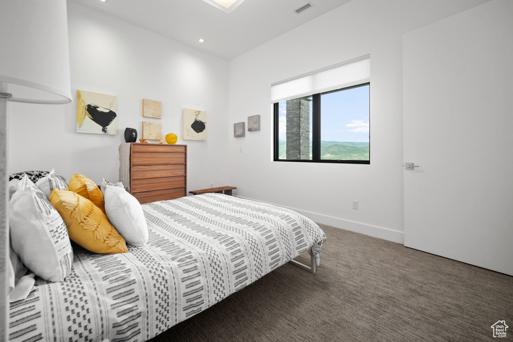 Bedroom featuring carpet flooring