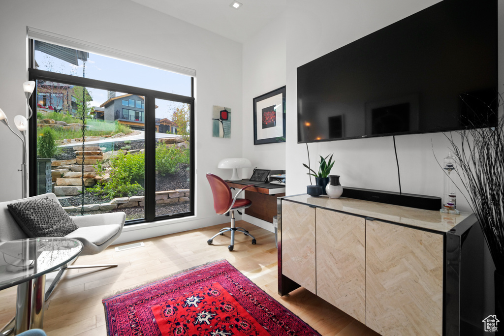 Office space featuring light hardwood / wood-style flooring