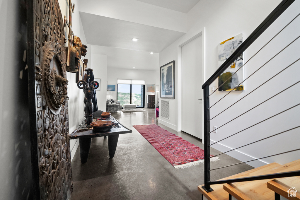 Foyer featuring concrete floors