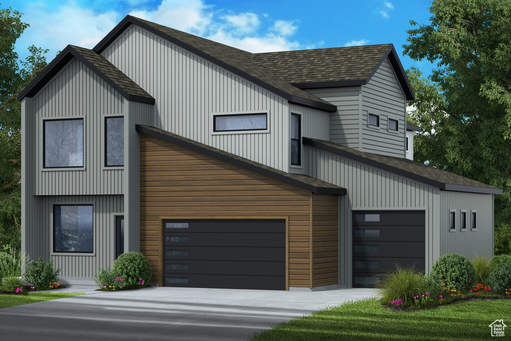 View of front of house with a garage