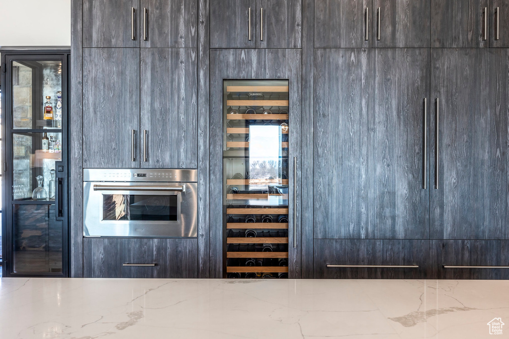 Bar area featuring stainless steel oven