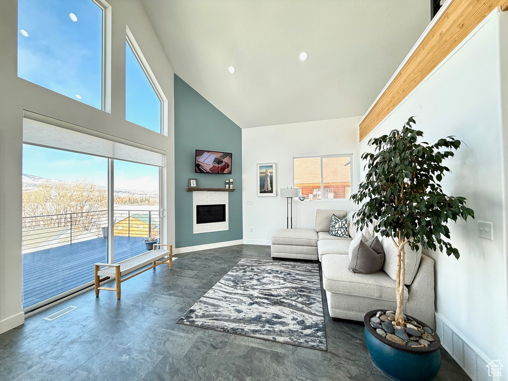 Living room featuring a high ceiling