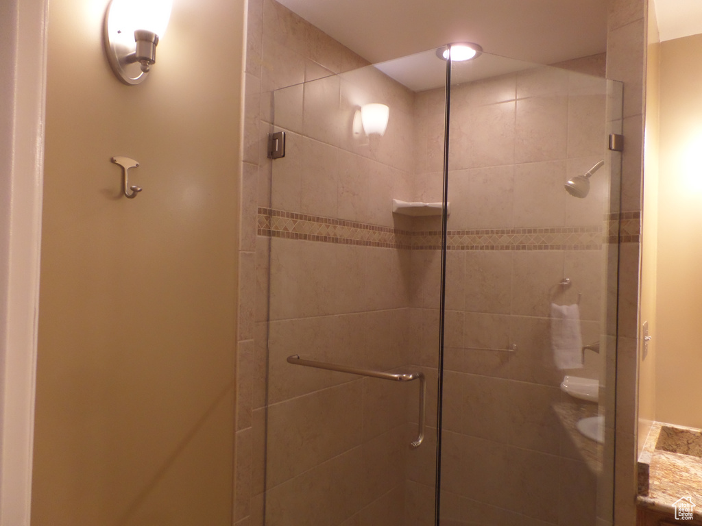 Bathroom with walk in shower and vanity
