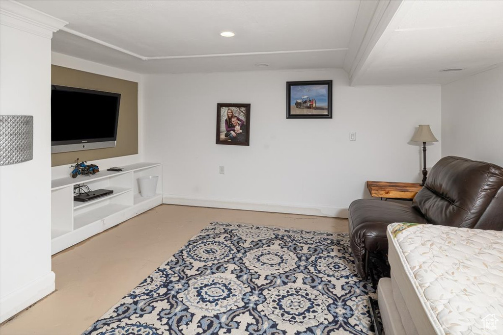 Living room featuring concrete flooring