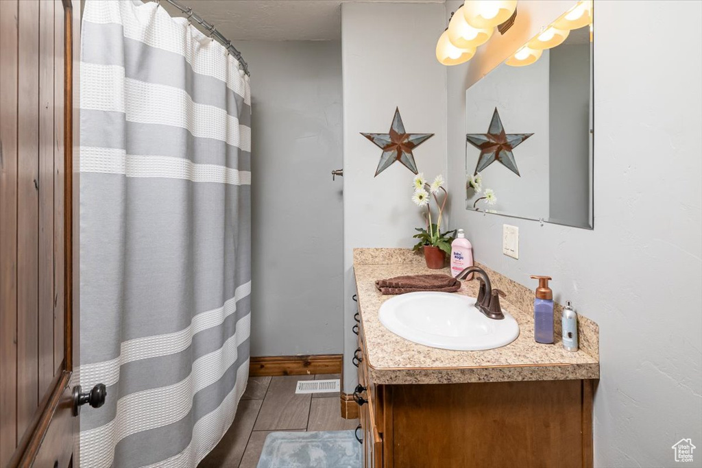 Bathroom featuring vanity