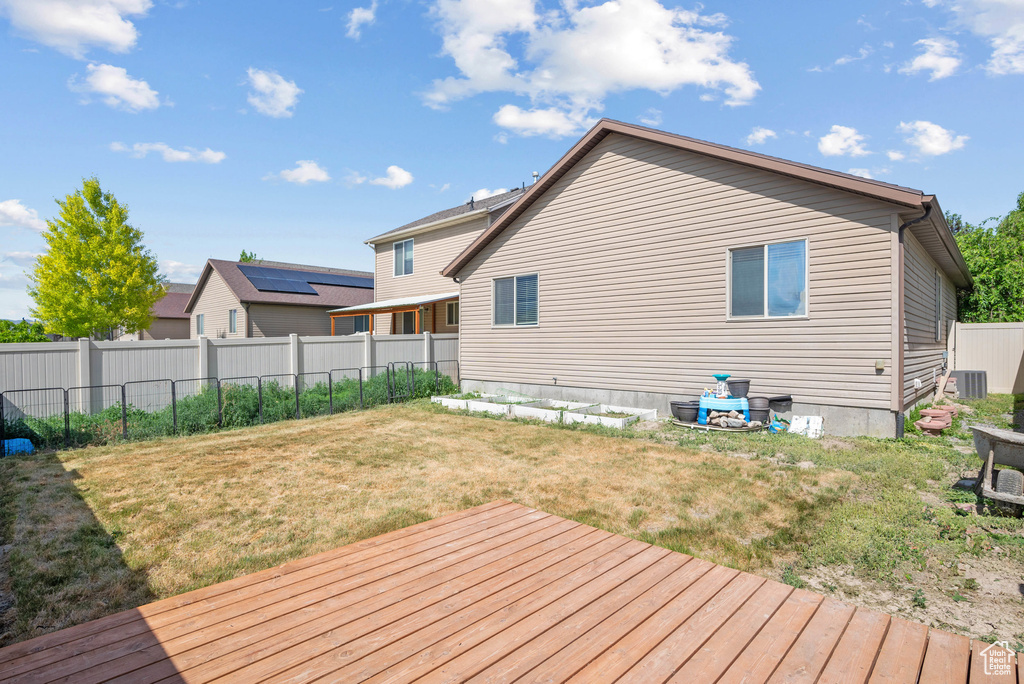 Wooden deck with central air condition unit