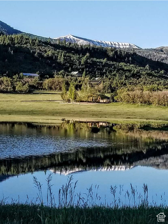 Property view of water featuring a mountain view