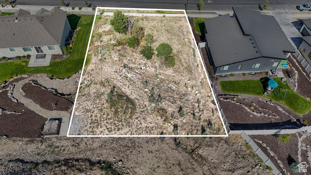 Aerial overview of property\'s location featuring property parcel outlined