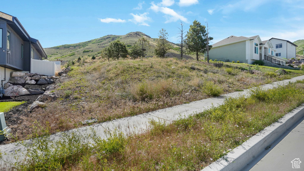 View of yard featuring a mountain view and a residential view