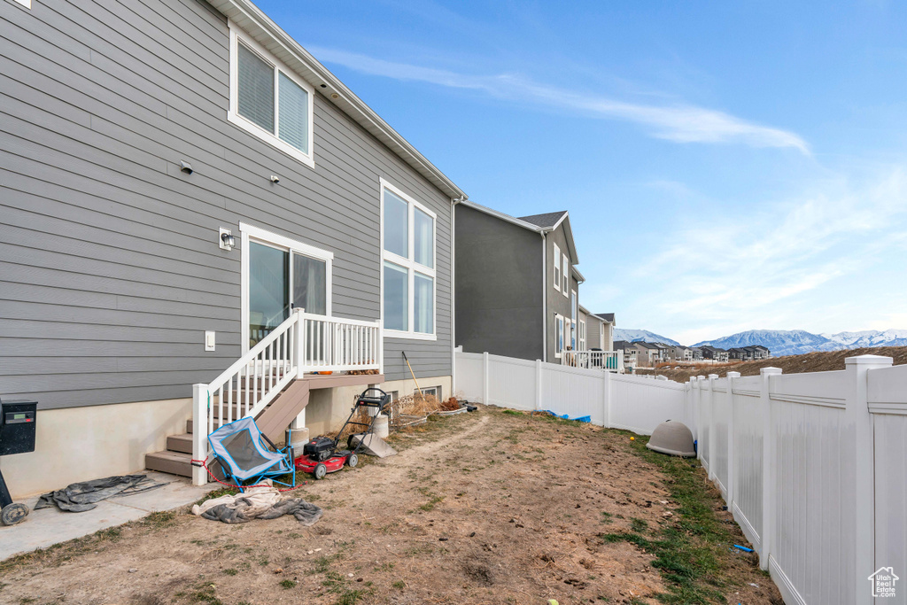 Back of house with a mountain view