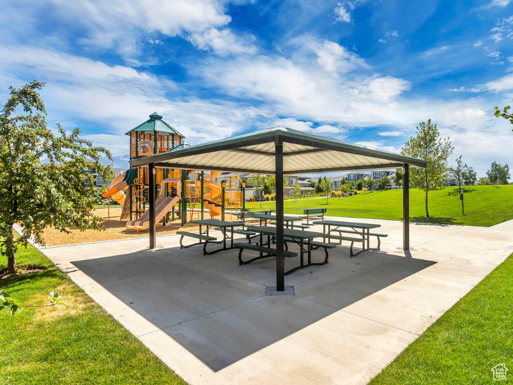 View of property\\\\\\\'s community featuring a yard and a gazebo