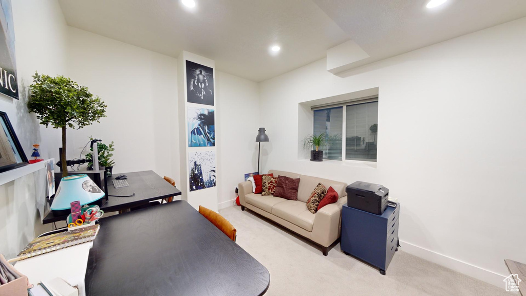 Home office with light carpet