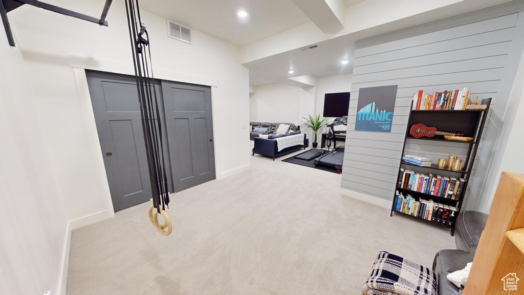 Interior space featuring carpet floors