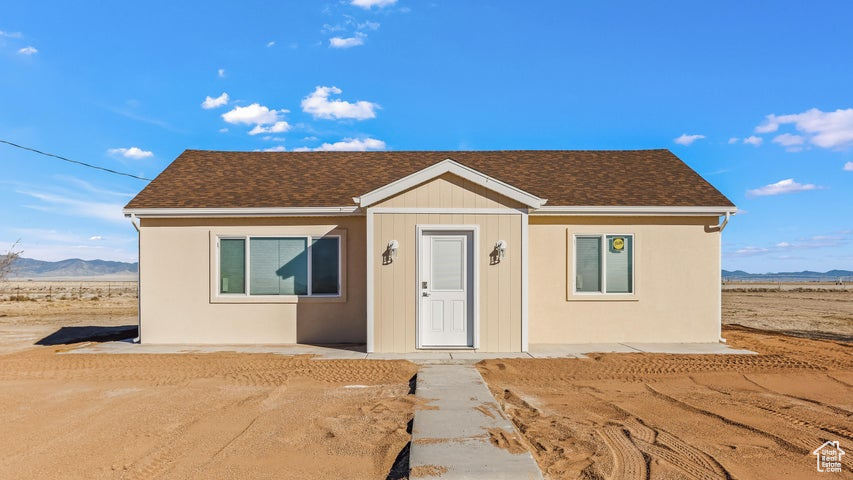 View of front of house featuring a mountain view