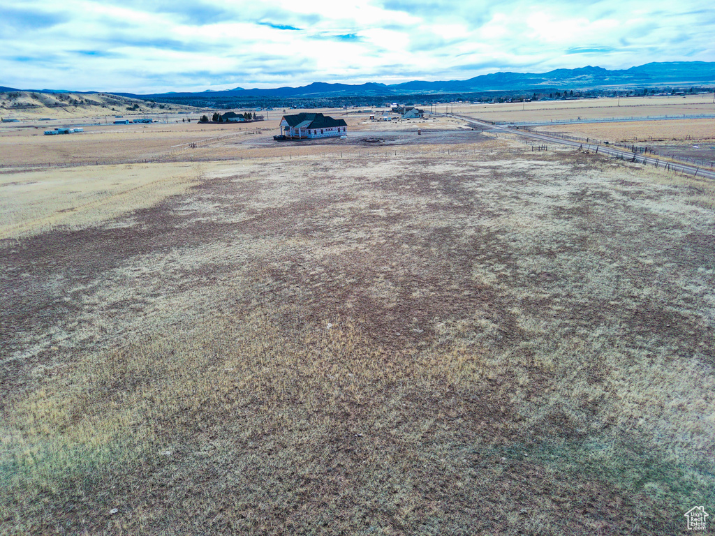 Drone / aerial view with a mountain view and a rural view