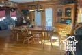 Dining area with hardwood / wood-style flooring