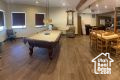 Game room featuring dark hardwood / wood-style floors
