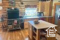 Kitchen with a center island and hardwood / wood-style floors