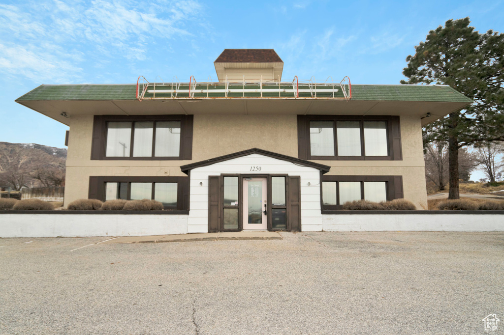 View of front of property featuring a mountain view